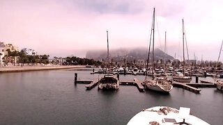 Gibraltar LIVE. Planes slipping in under the low cloud.