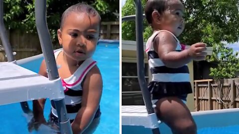 Fearless toddler impressively swims independently in the pool