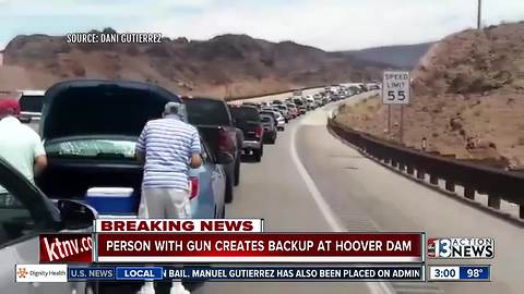 Person with gun causes traffic backup at dam