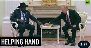 Putin helps South Sudan president with headset
