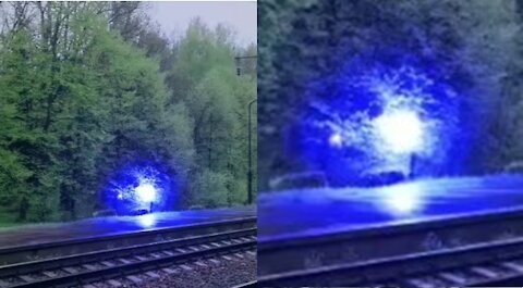 Look at this glowing orb crossing railway tracks… What the heck is that?