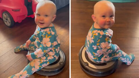 Thrill-seeking Baby Goes For Ride On Robot Vacuum