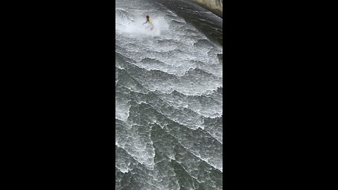 Kid slides at irrigation like a PRO!