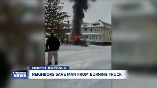 Neighbors save man from burning truck