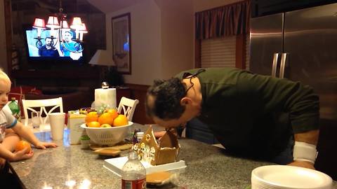 "Man Crushes Gingerbread House with His Forehead"