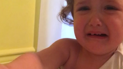 Toddler Struggles To Put On Her Shirt But Claims "I Got It!"