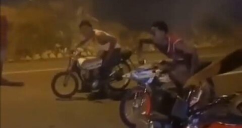 STREET RACING IN THE DOMINICAN REPUBLIC GOES SIDEWAYS. I THINK THE DUDE IN THE CAR CHEATED.🏍️💥🚗