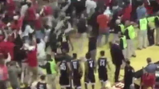 West Virginia Basketball Player Punches Fan As Fans Rush The Court