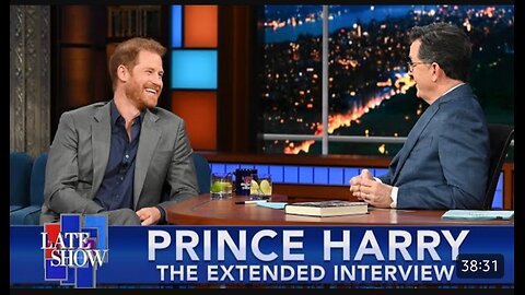 Prince Harry , The duke of sussex , talks with Stephen colbert.