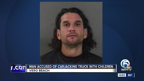 Man accused of carjacking vehicle with children inside