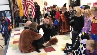 Wisconsin military dad surprises daughters at school Halloween parade