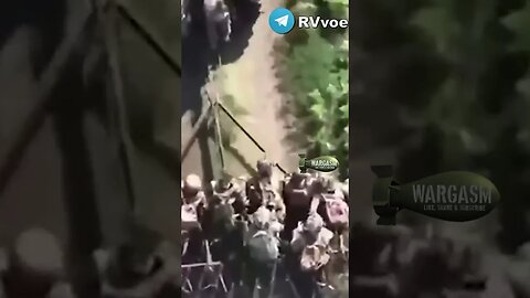 Ukrainian soldiers catch a ride on a plough