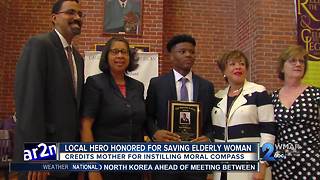 Local hero who saved woman from burning building credits mom for guiding him