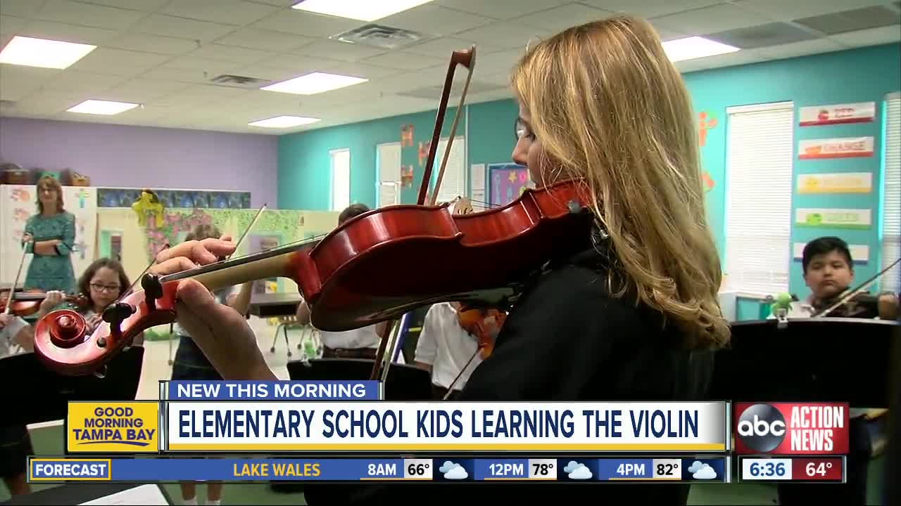 Principal helping students thrive with violin lessons in Pinellas County