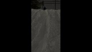 Snowsliding on snow day in Abbotsford, BC. Canada