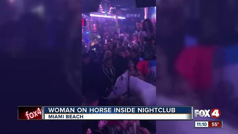 Woman on Horse Inside Nightclub