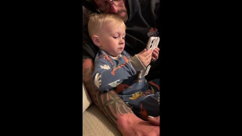 Toddler's emotional response to slideshow of his parents