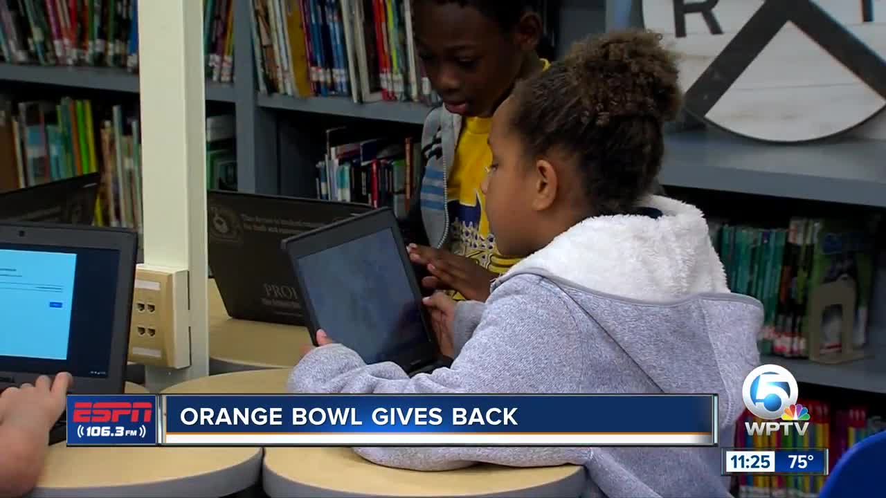 Orange Bowl gives back to Sunset Elementary 11/13