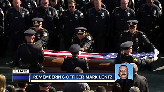 Full military flag presentation for MPD Officer Lentz