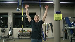 He holds a world record for pull-ups. His day job is just as impressive