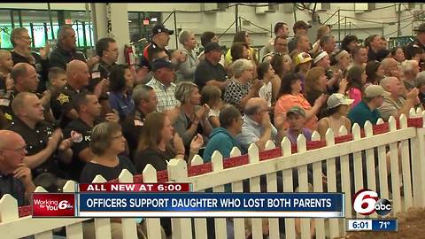 Officers pack Indiana State fair goat show to support daughter of dispatcher who died unexpectedly