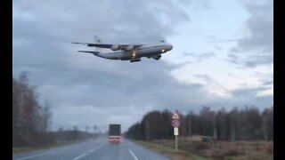 Plane flies dangerously close to road