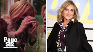 Sonja Morgan manages to drink wine through her face mask