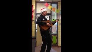 Officer Beesley sings Feliz Navidad