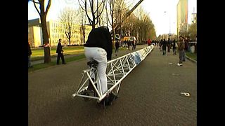 Students Ride 28 Meter Bike