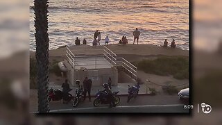 Crowds gather at Sunset Cliffs after some parks reopen