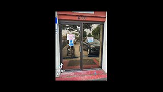 Commercial storefront door repair; door hinges/pivots replacement, in Pompano Beach, Florida.