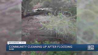Globe community cleaning up after flooding