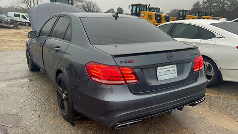 BUYING A E63S AMG MERCEDES BENZ AT COPART FOR $15,000 WITH SMOKE COMING FROM ENGINE!