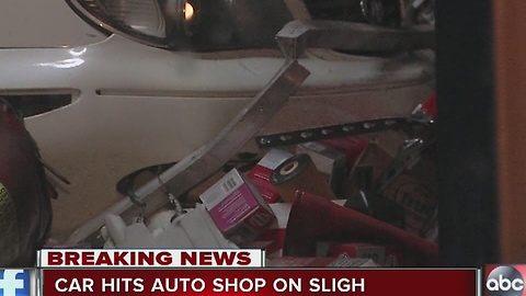 Car slams into auto shop on Sligh Avenue, driver on the run