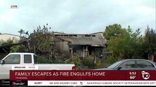 Family escapes as fire engulfs Talmadge home