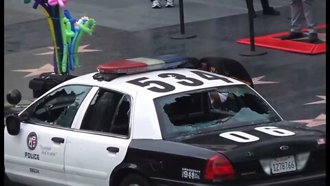 Man Smashes LAPD car windows on Hollywood Blvd, steals laptop