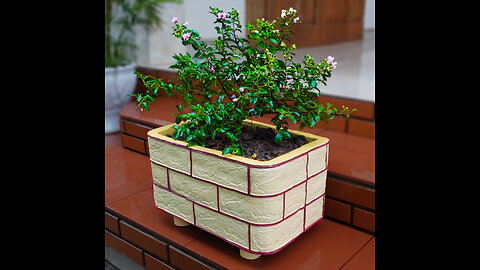 Try making a pot of cement and porous wall tiles - beautiful and easy