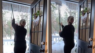 Woman nearly gets completely covered in snow