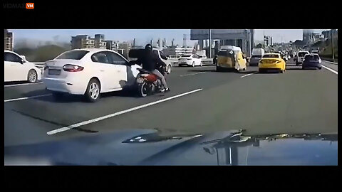 Dude On A Motorbike Knocks Off A Car's Mirror, Gets Some Instant Karma