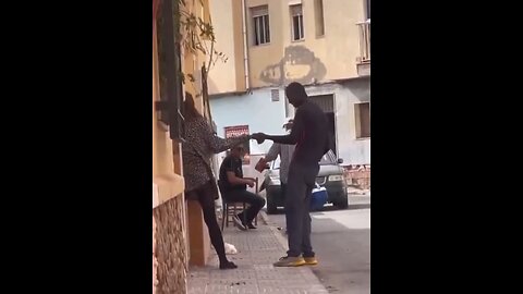 Illegal African migrant assaults a woman in Spain and the men do nothing and walk away