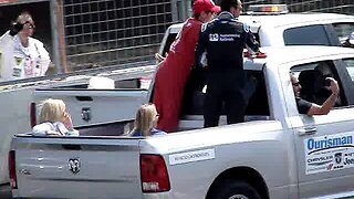 Indy driver Helio Castroneves picks up a blond in his truck!!