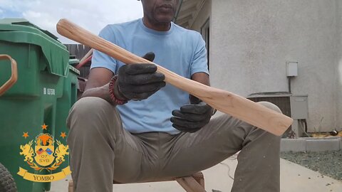 Yombo is making a Mupanji ( Fufu Spatula)