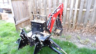 Reattaching the backhoe to the RK24 compact tractor