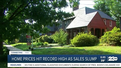 Home prices hit record high as sales slump