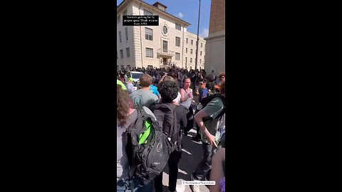 Texas police fire pepper spray at crowd with one student activist having to drench himself in water.