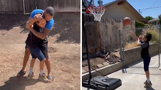 Dad surprises son with his very own basketball hoop