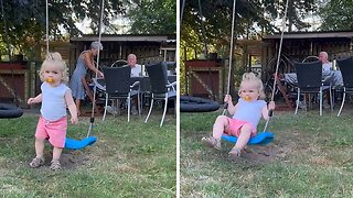 One-year-old Discovers How To Swing On Her Own