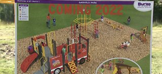 Lorain firefighters help build community park
