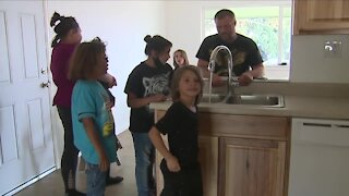 Volunteers finish remodel for Adams County family with 8 special needs kids