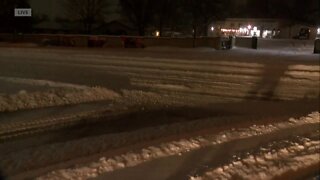 Snow is blowing and covering the roads in Lakewood